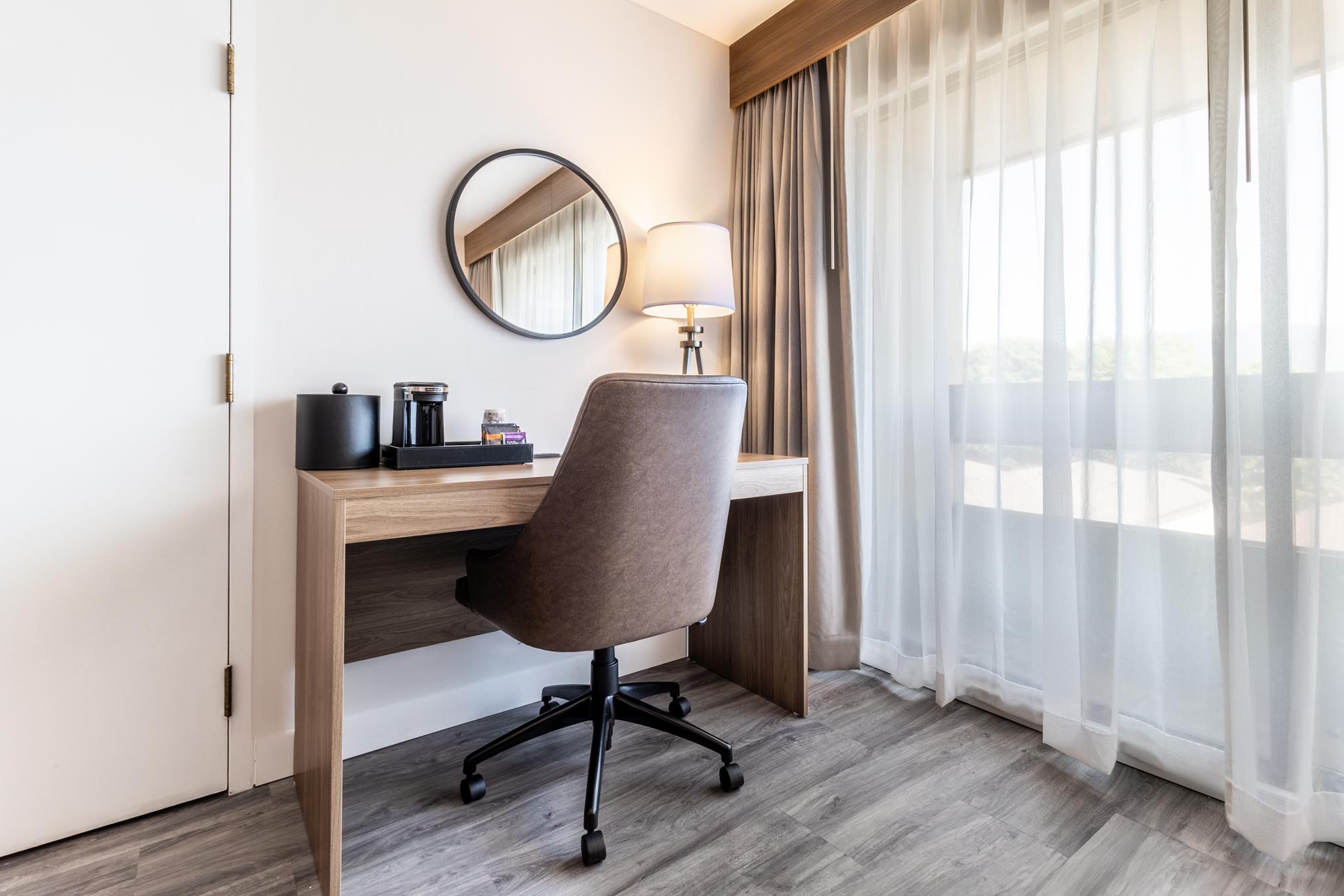 Desk and chair in hotel room