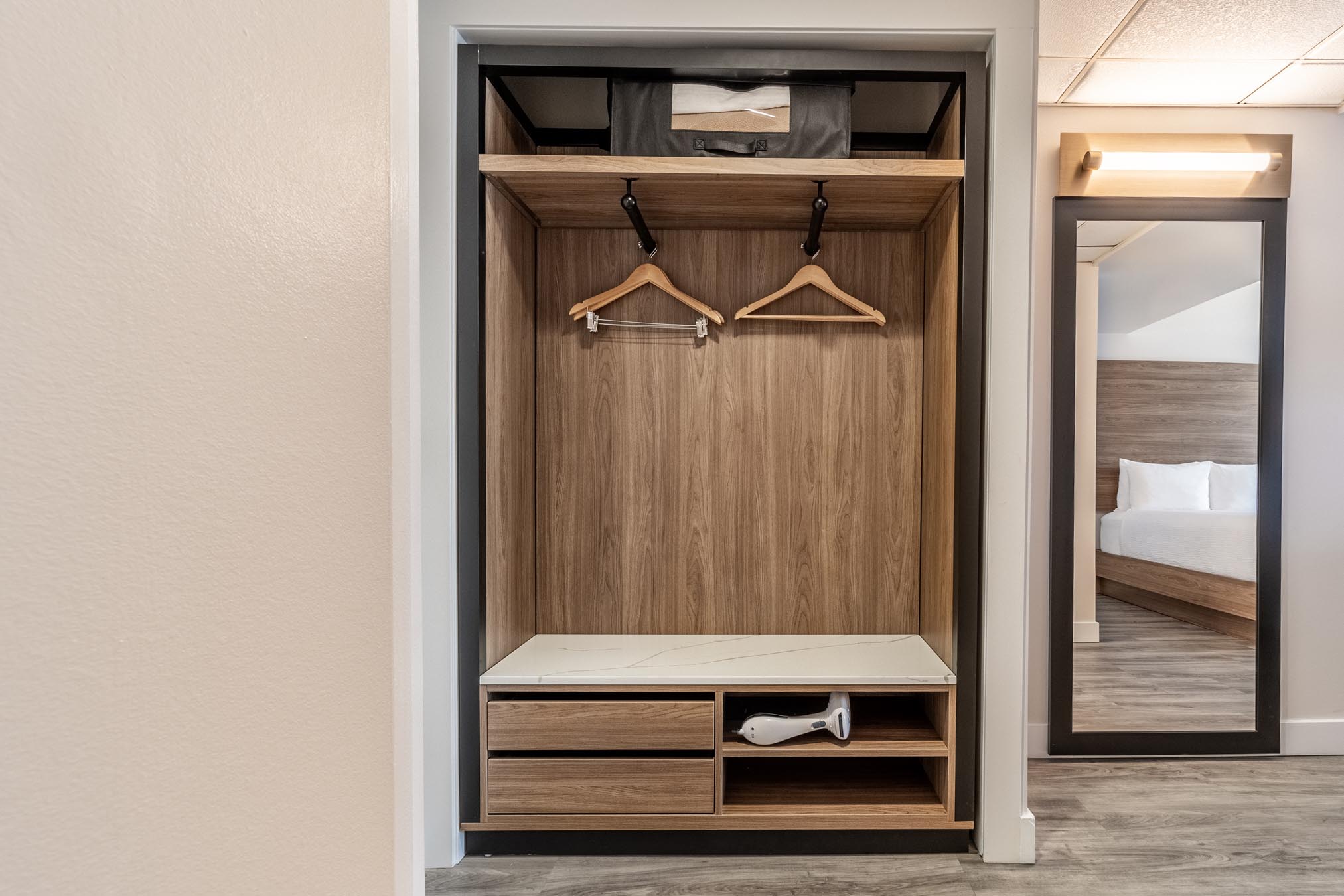 Large closet and mirror in hotel room