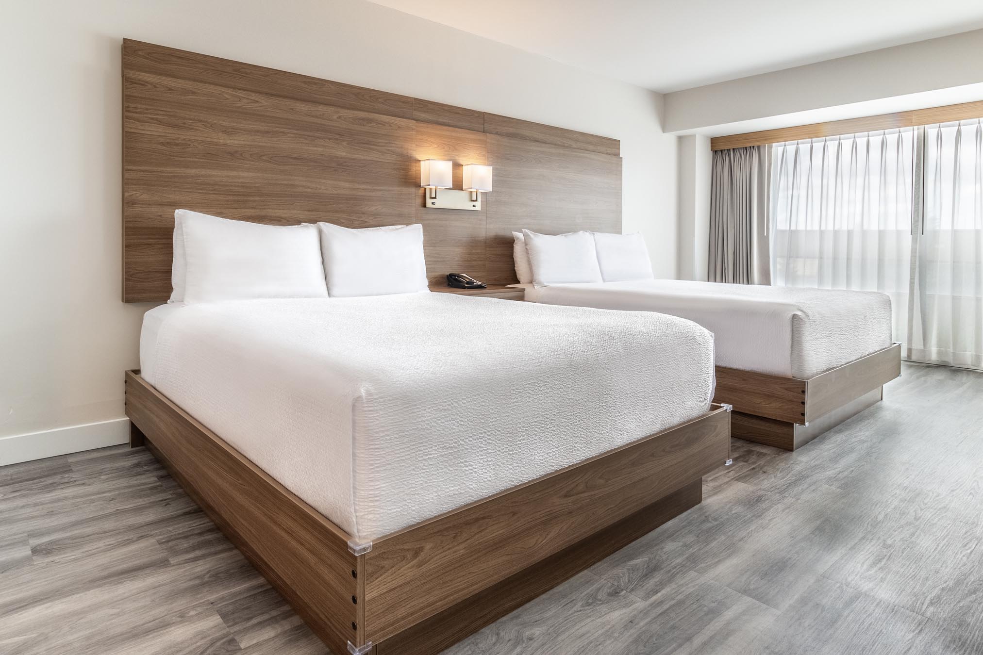 Two queen beds in Vancouver hotel room